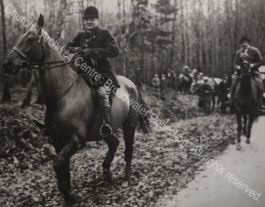 Photo shows WSC on horseback.