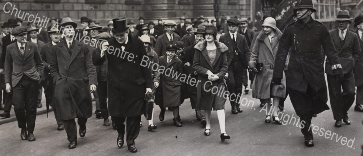 Photo shows WSC walking in a crowd of people