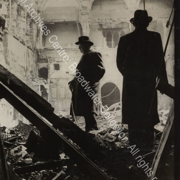 WSC in silhouette in the bomb-damaged House of Commons.