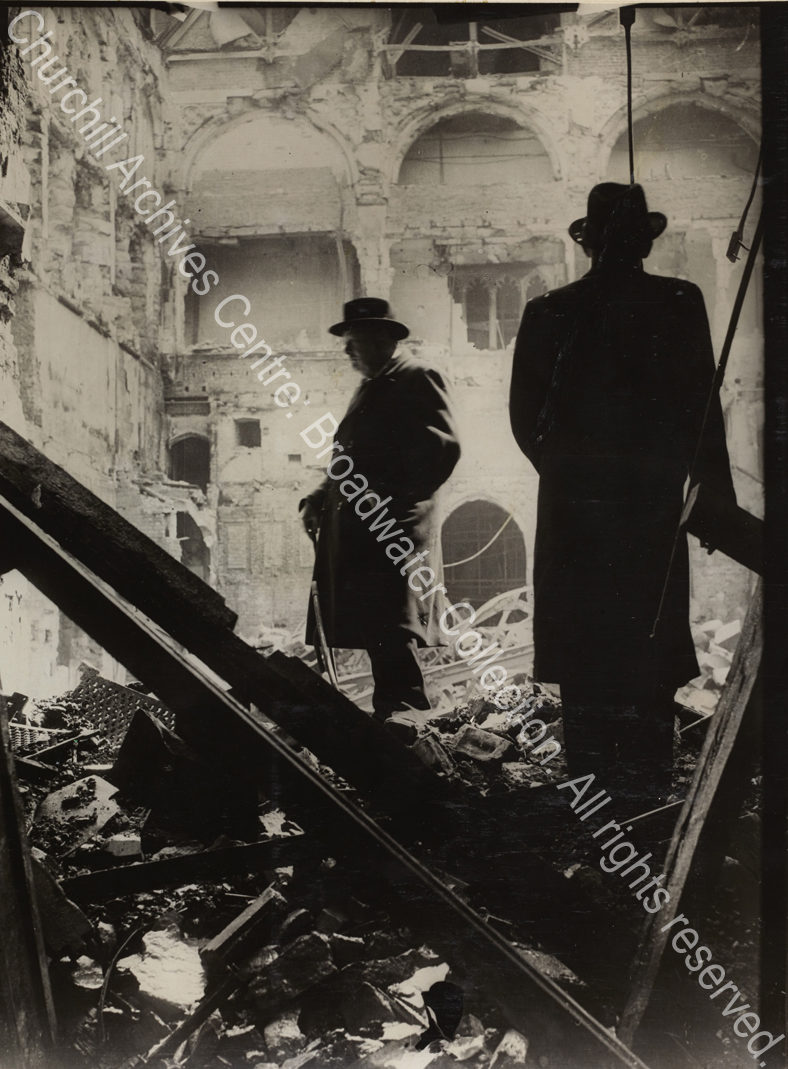 WSC in silhouette in the bomb-damaged House of Commons.