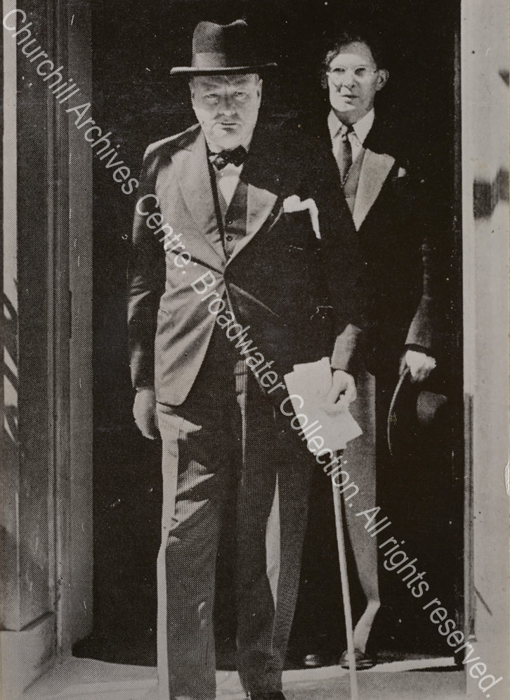 WSC is shown leaving a building