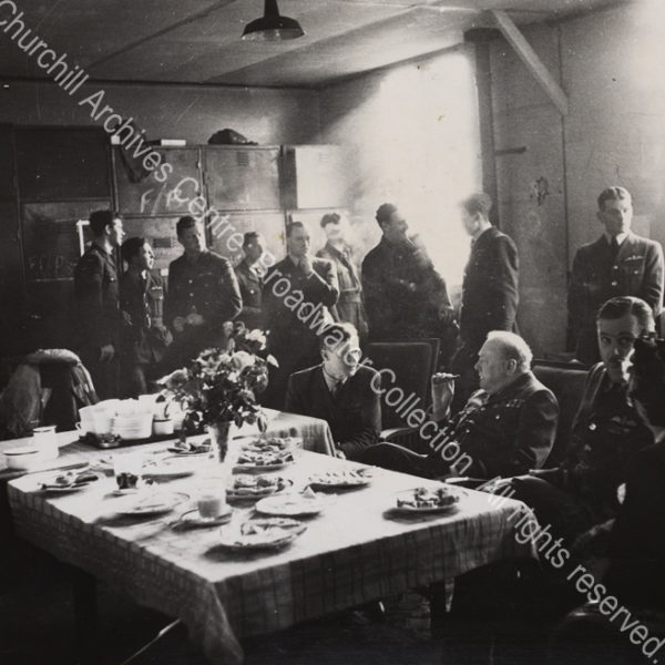 Photo shows WSC sitting ?in the mess at RAF Manston
