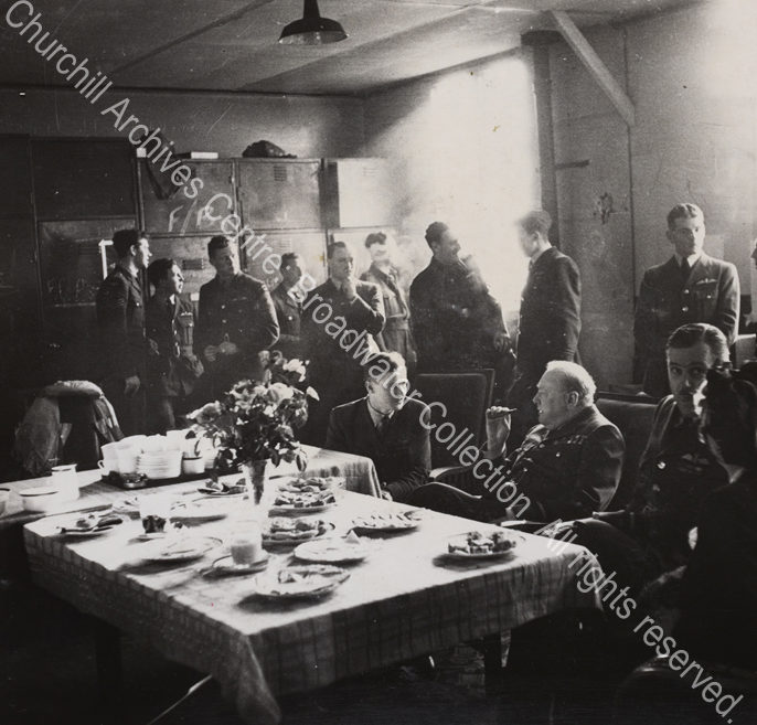 Photo shows WSC sitting ?in the mess at RAF Manston