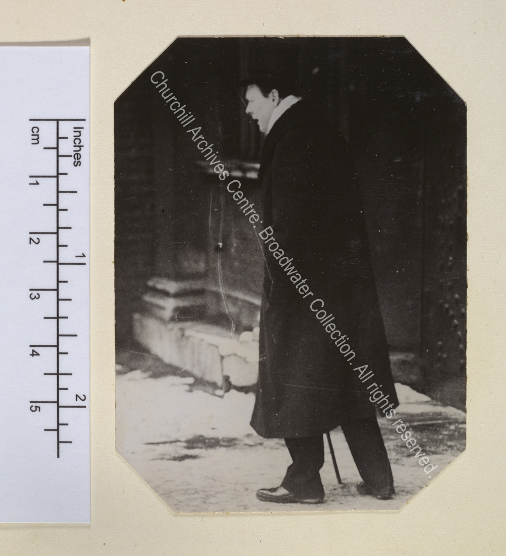 WSC is shown in profile walking away from camera.