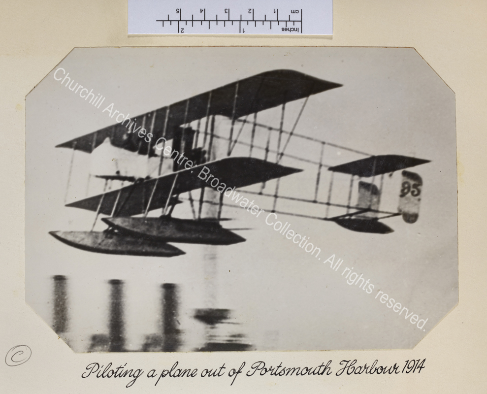Photo shows a sea-plane in flight.