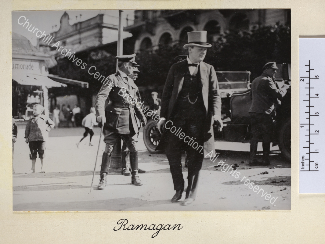 Photo shows a street scene with WSC in the centre looking away from the camera.