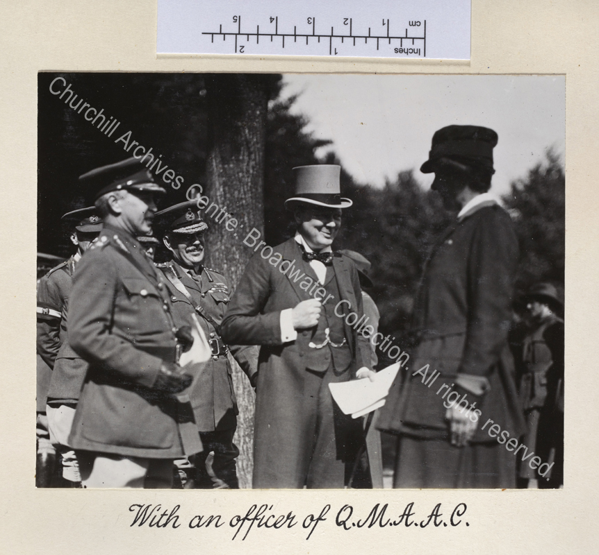 Photo shows WSC smiling and talking to a female officer during visit to inspect British forces in Cologne