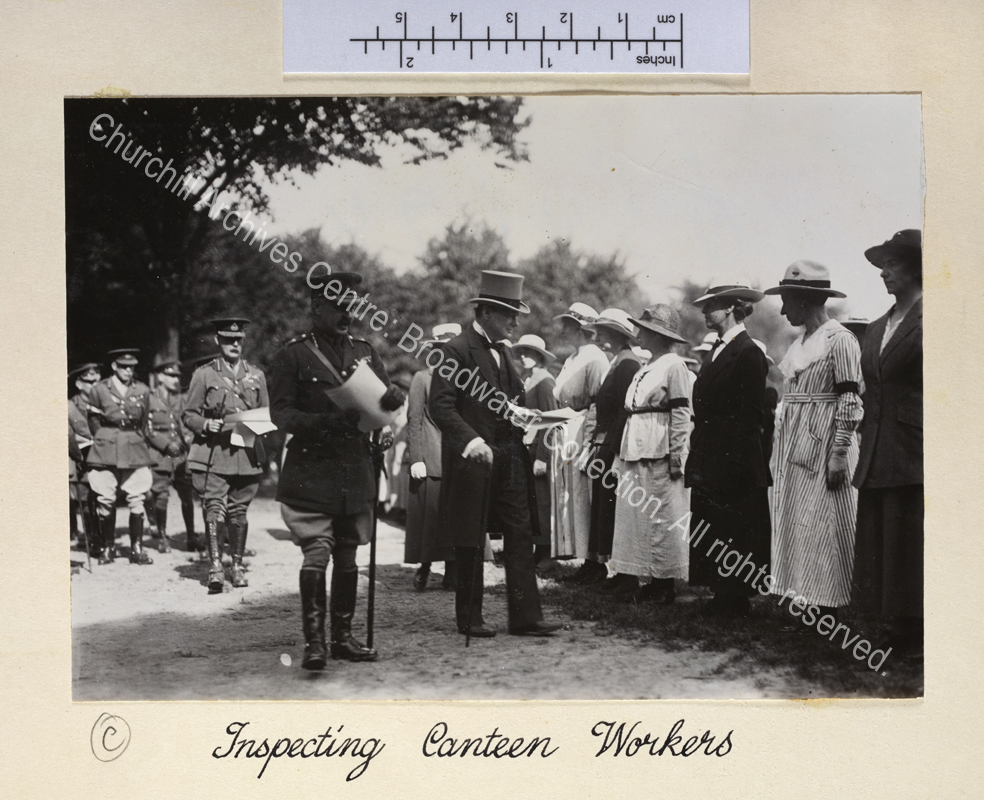 Photo shows WSC inspecting a line of female canteen workers during visit to inspect British forces in Cologne