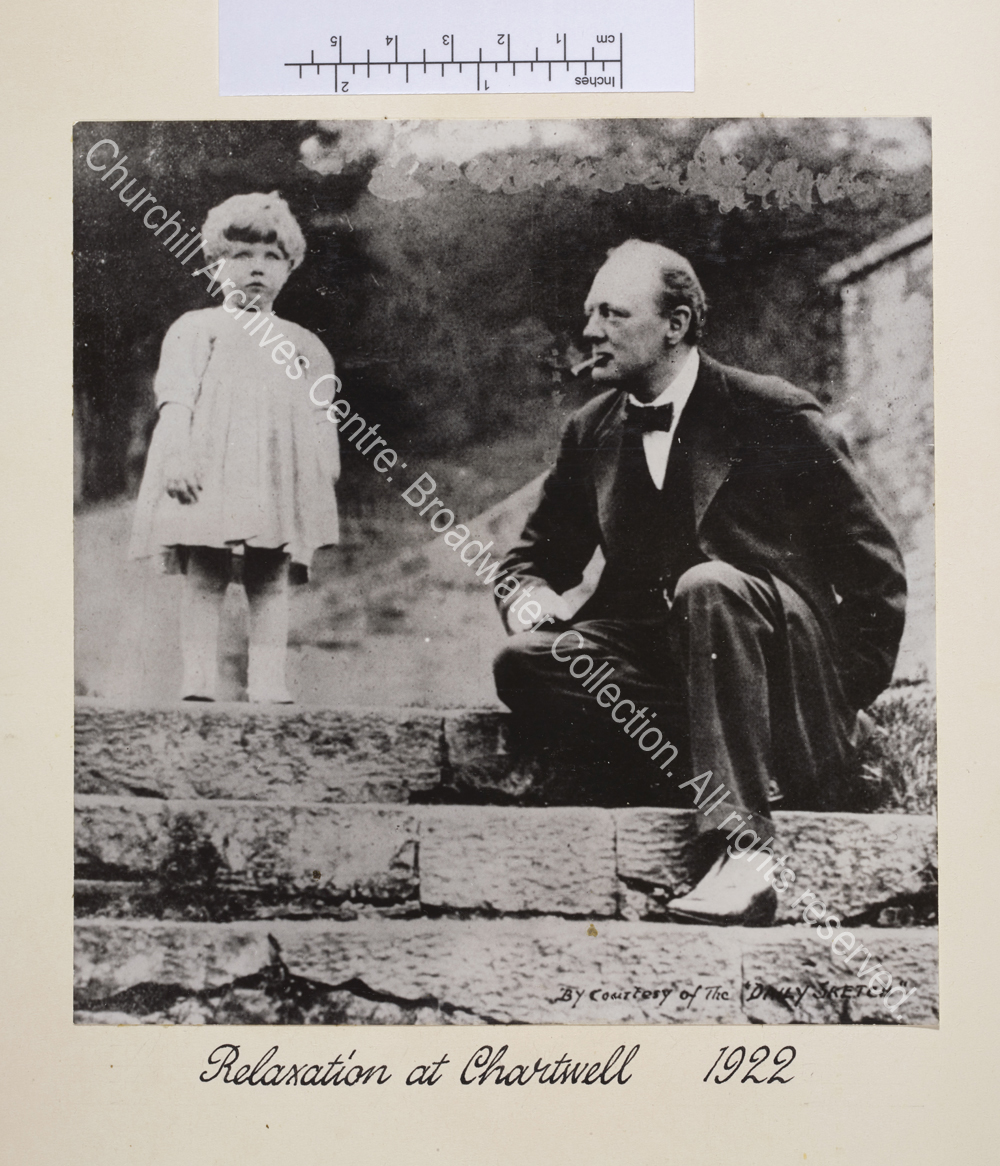 Photo shows WSC sitting on steps