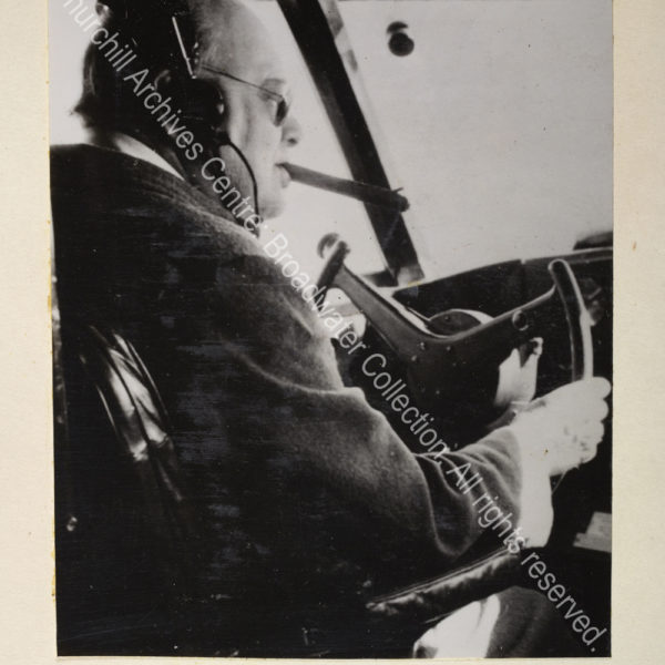 Photo showing WSC in the cockpit of a plane