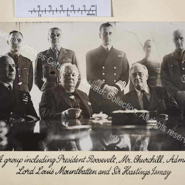 Seated at a table (from left to right): Admiral Ernest King [Commander in Chief United States Fleet and Chief of Naval Operations]