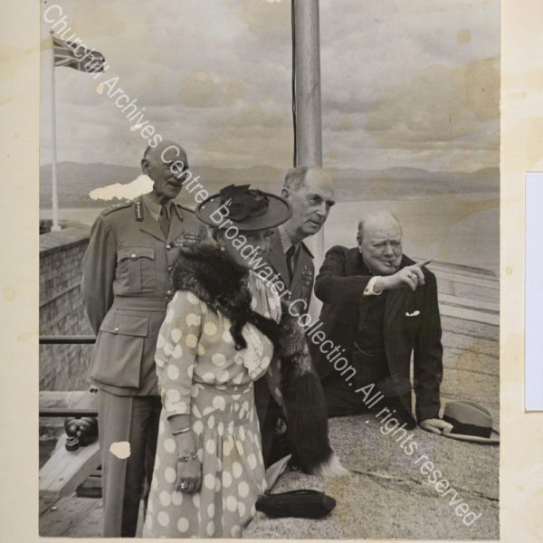 Photograph taken at the battlement of the Citadel at Quebec showing WSC pointing [to the flying boat bearing Antony Eden