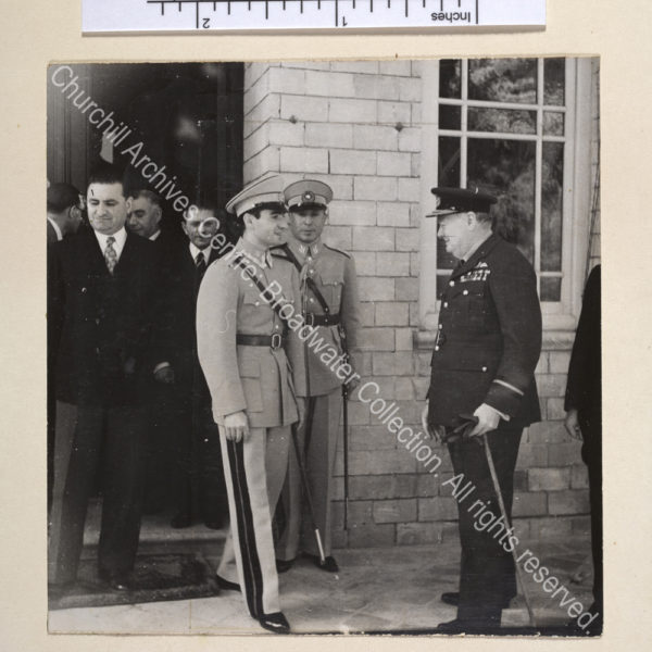 Photo shows the Shah of Persia [Mohammed Reza Pahlavi] greeting WSC in Tehran. Both are in uniform.