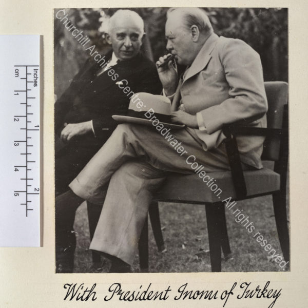 Photo shows WSC leaning in to listen to the President of Turkey