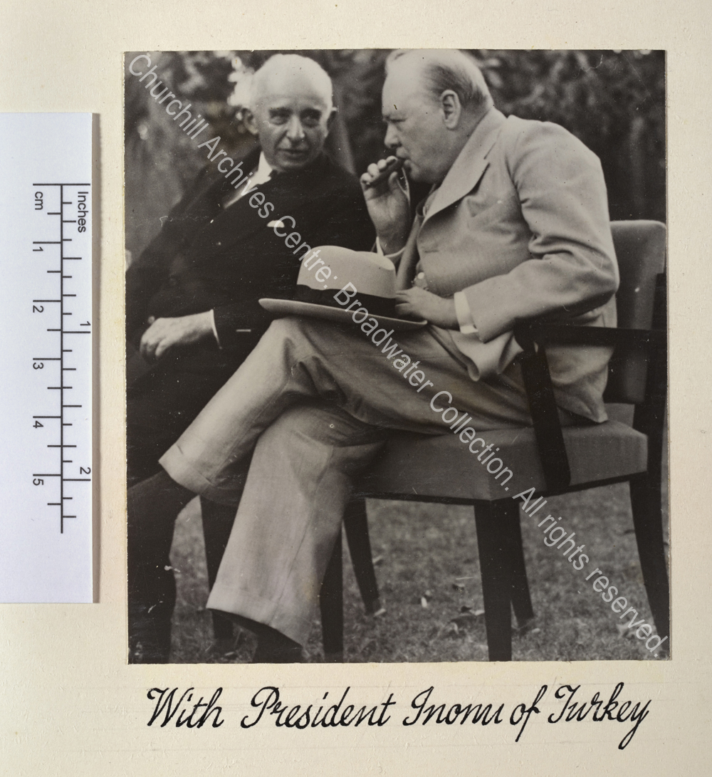 Photo shows WSC leaning in to listen to the President of Turkey