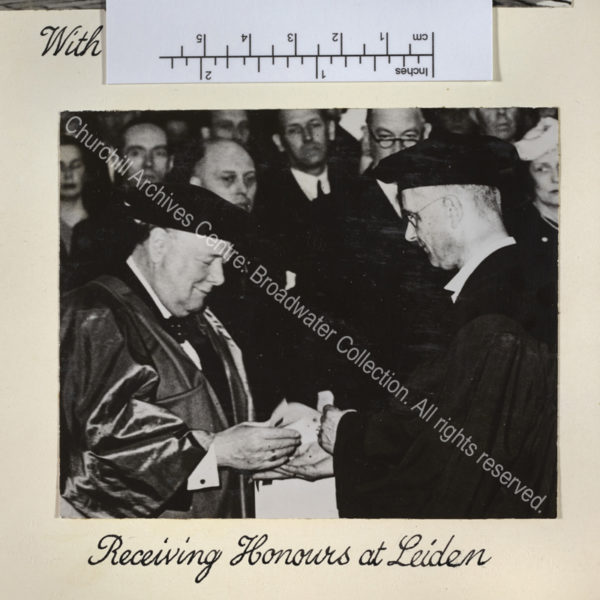 Photo shows WSC being awarded an Honorary Doctorate of Law by Professor Rudolph Cleveringa. WSC is wearing academic dress.