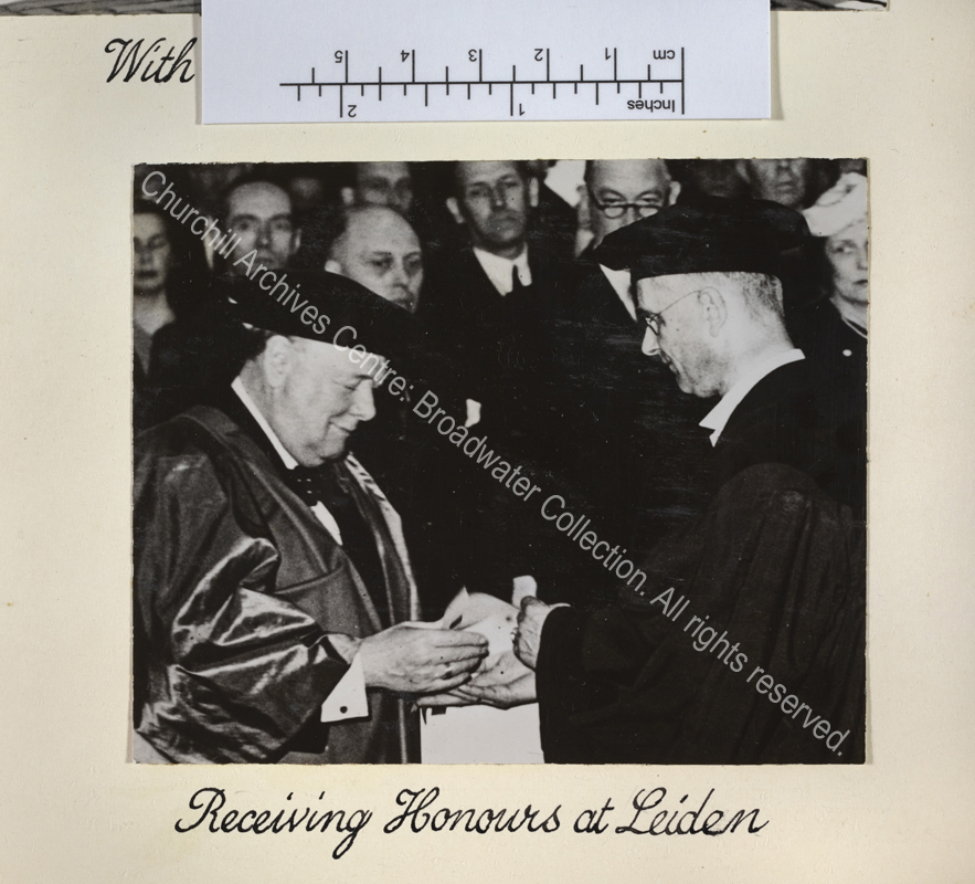 Photo shows WSC being awarded an Honorary Doctorate of Law by Professor Rudolph Cleveringa. WSC is wearing academic dress.