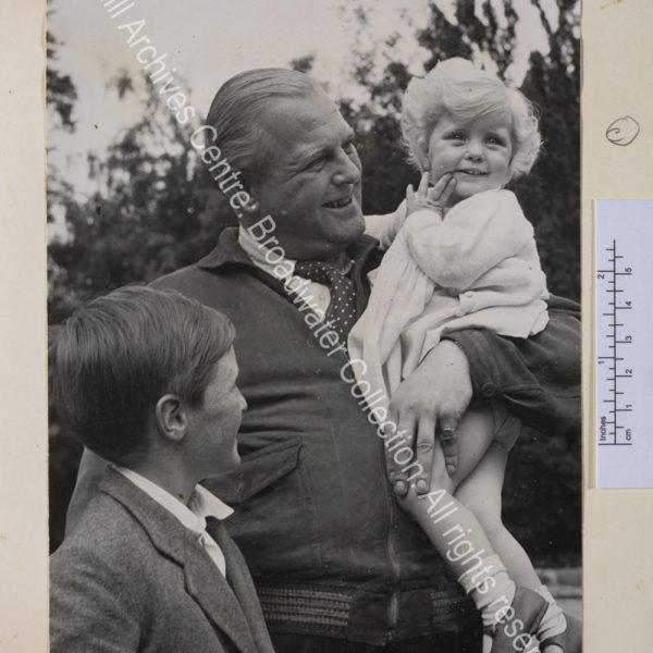 Photo shows Randolph Churchill holding Arabella Churchill in his arms