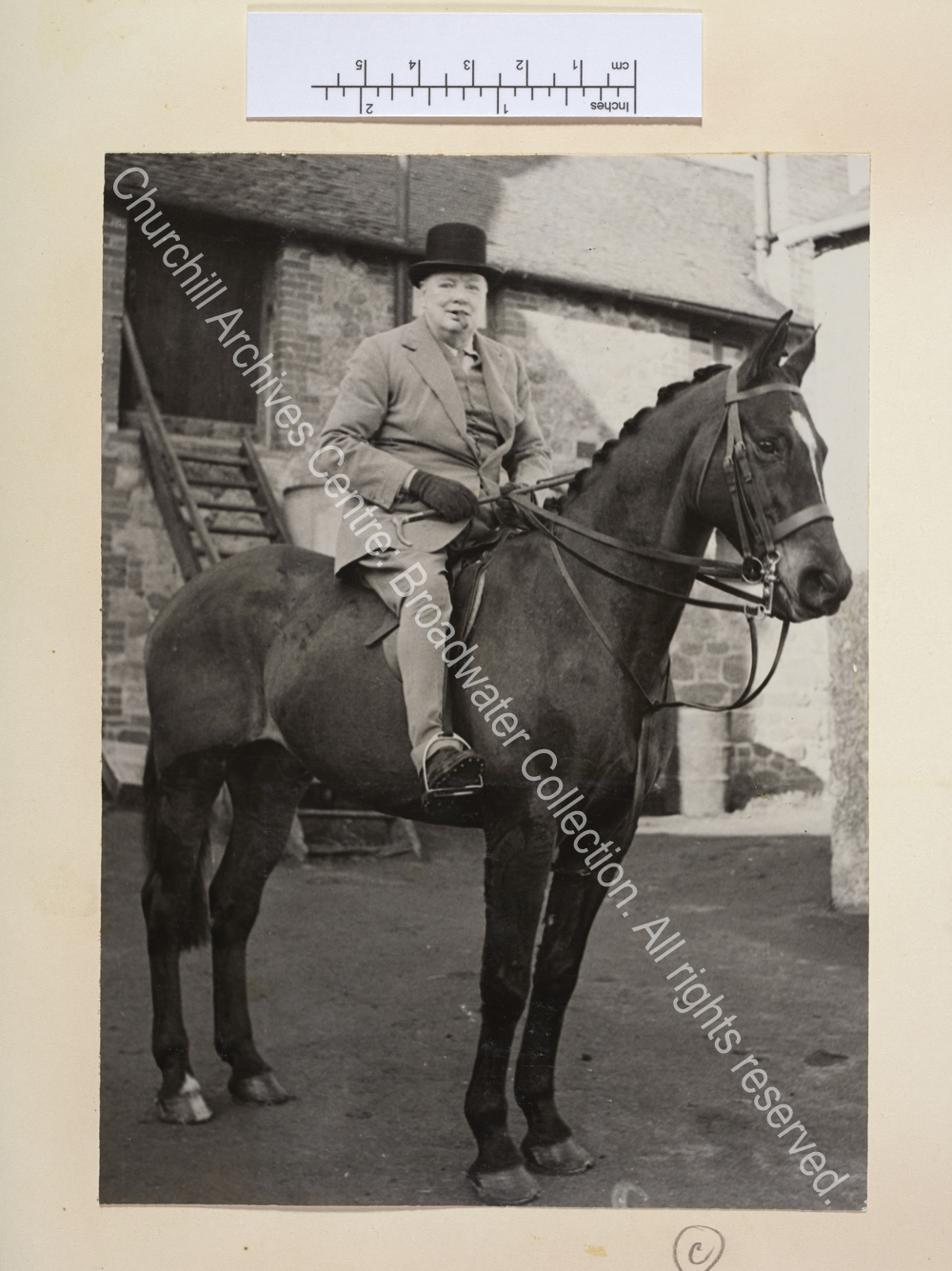 Photo shows WSC mounted on a horse. [The occasion was WSC joining the Surrey and Burstow hunt to celebrate his 74th birthday].