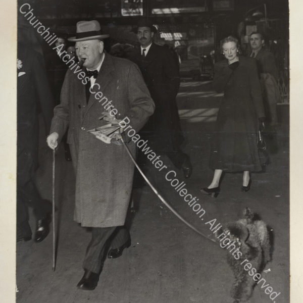 Photo of WSC wearing a suit and overcoat