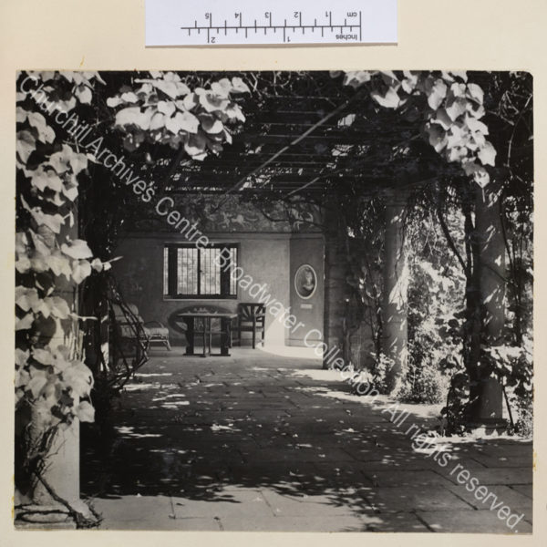 View of vine covered pergola leading to Marlborough pavilion.