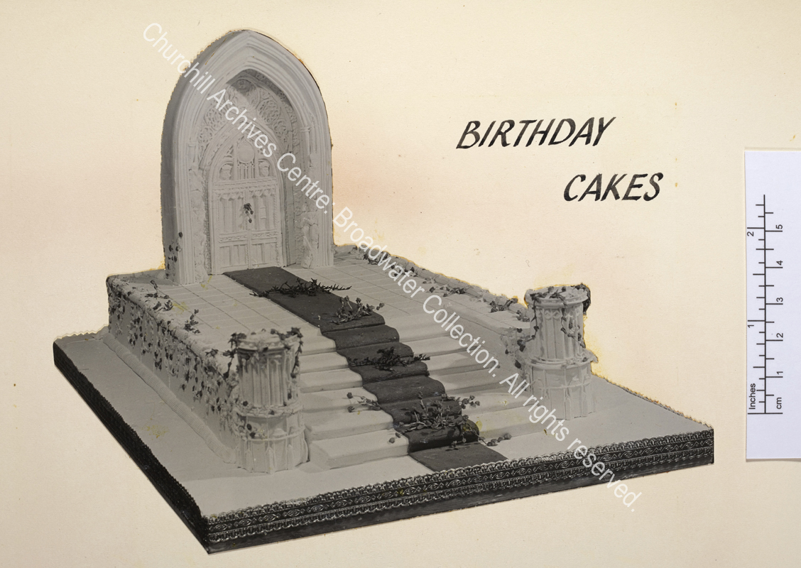 Birthday cake in the shape of a ?church door and steps leading up to it.