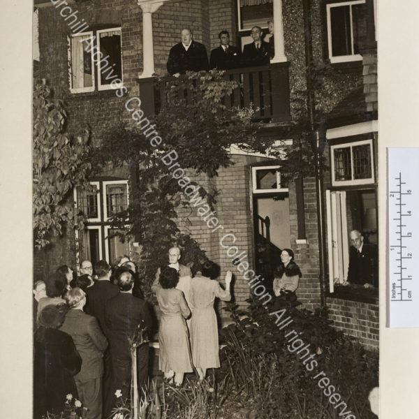 Photo shows WSC on the balcony [?of a house in Woodford