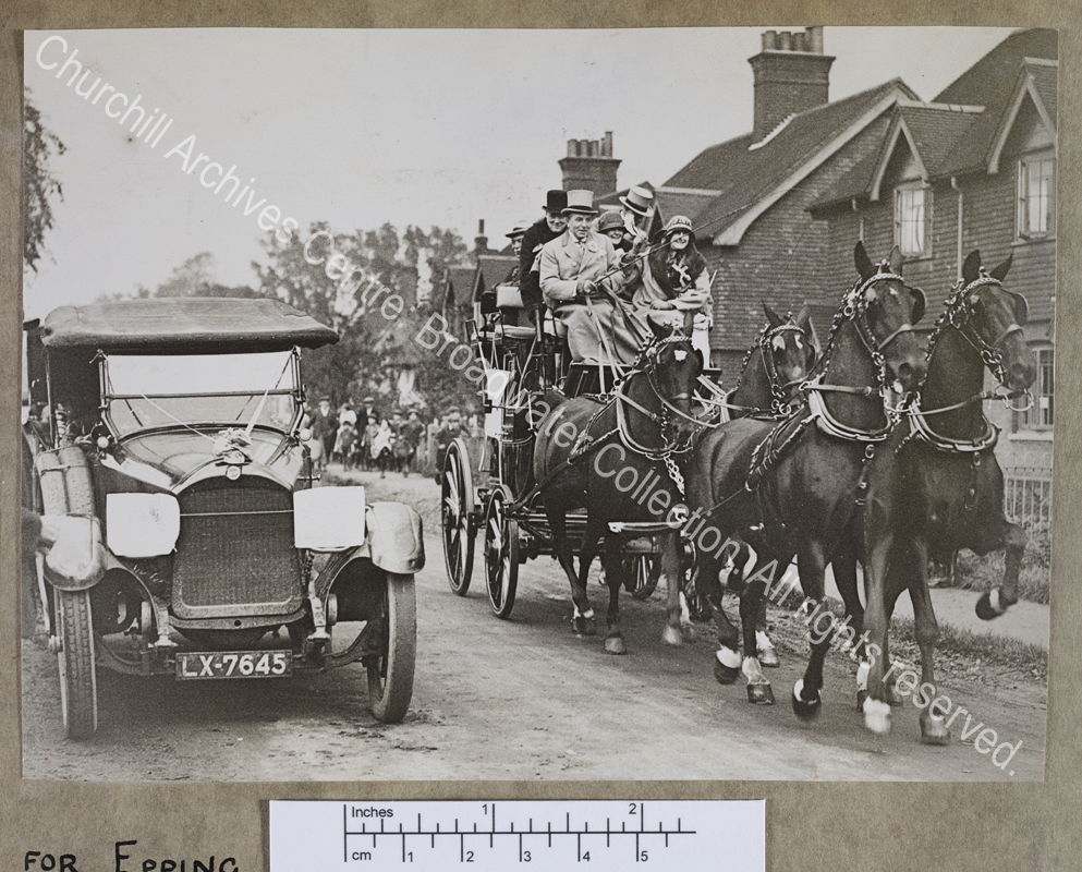 Photograph of WSC and others as passengers on top of a coach drawn by four horses