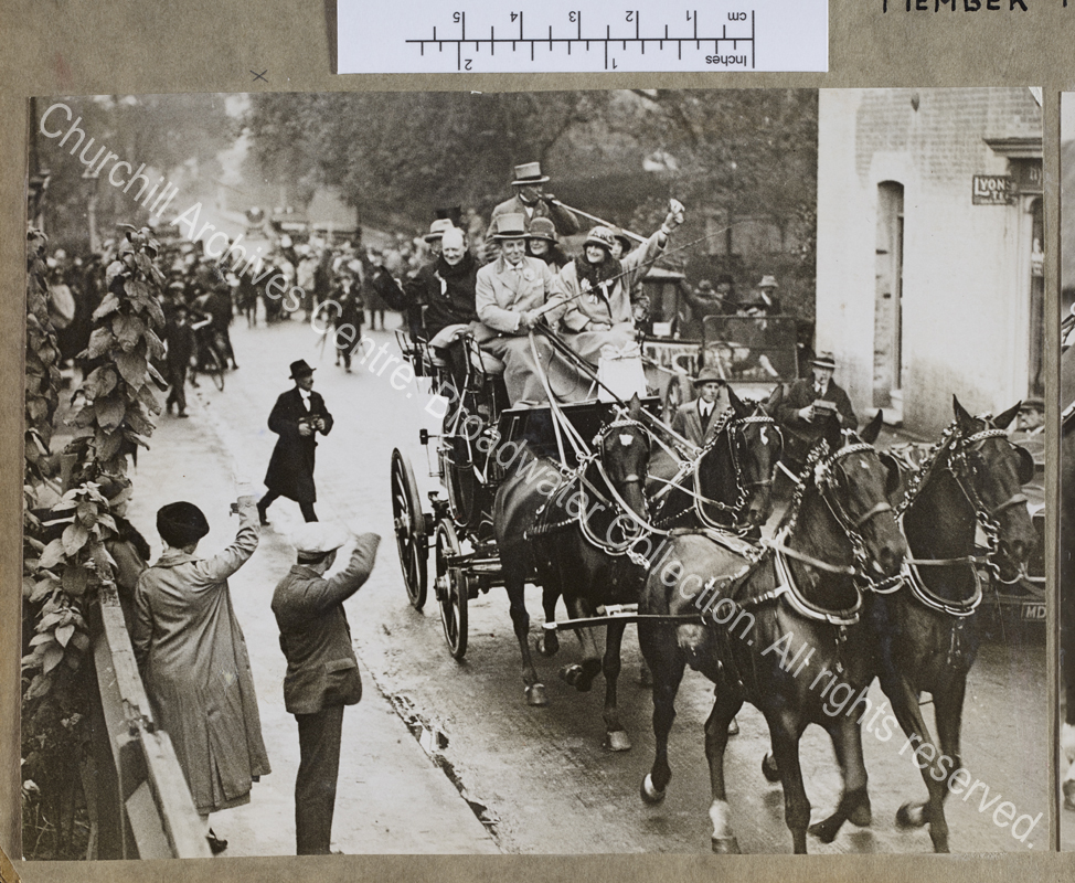 Photograph of WSC and others as passengers on top of a coach drawn by four horses