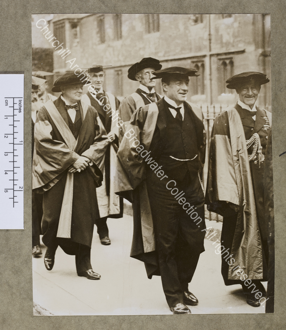 Full-length photograph of WSC walking in procession with others receiving honorary degrees