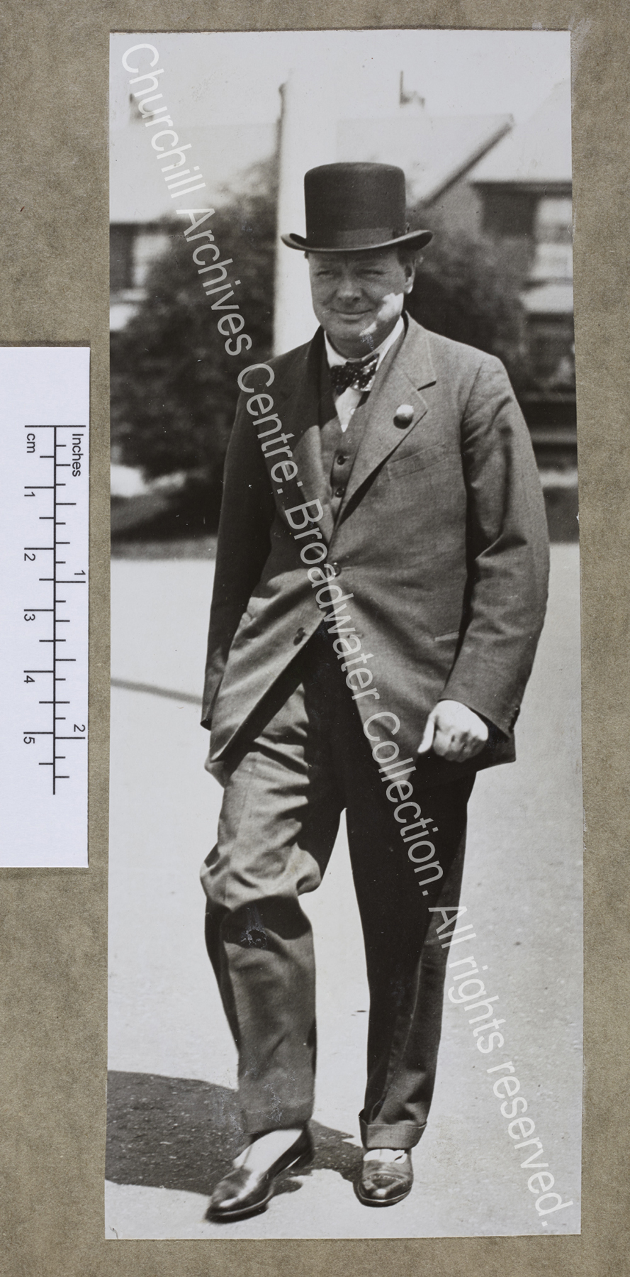 Full-length photograph of WSC [? during the General Election campaign in Epping