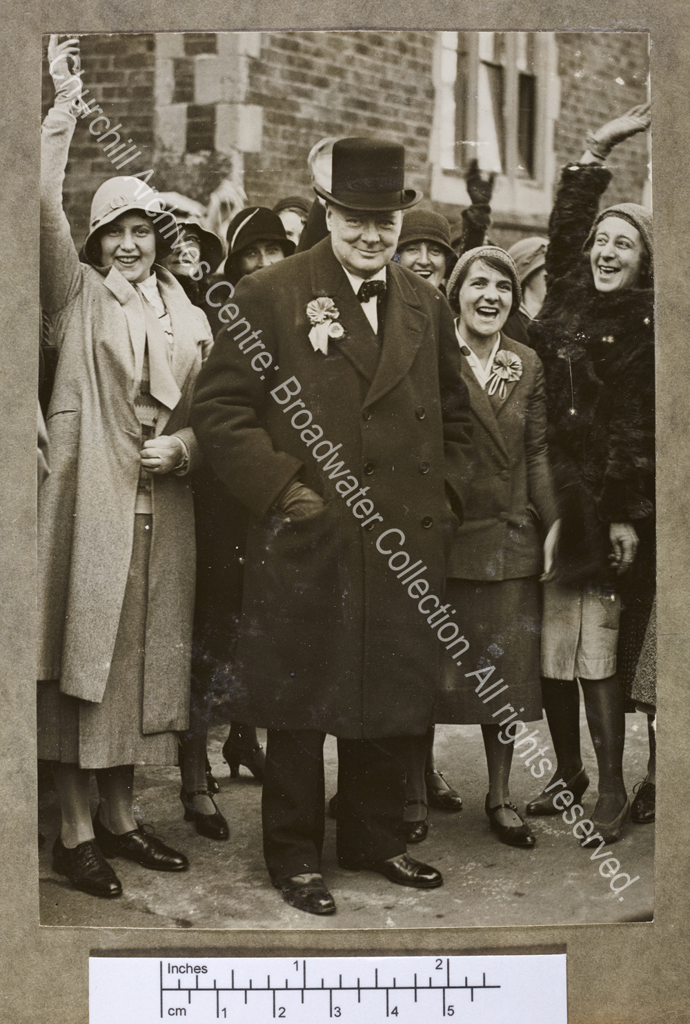 Full-length photograph of WSC [during the General Election campaign in Epping
