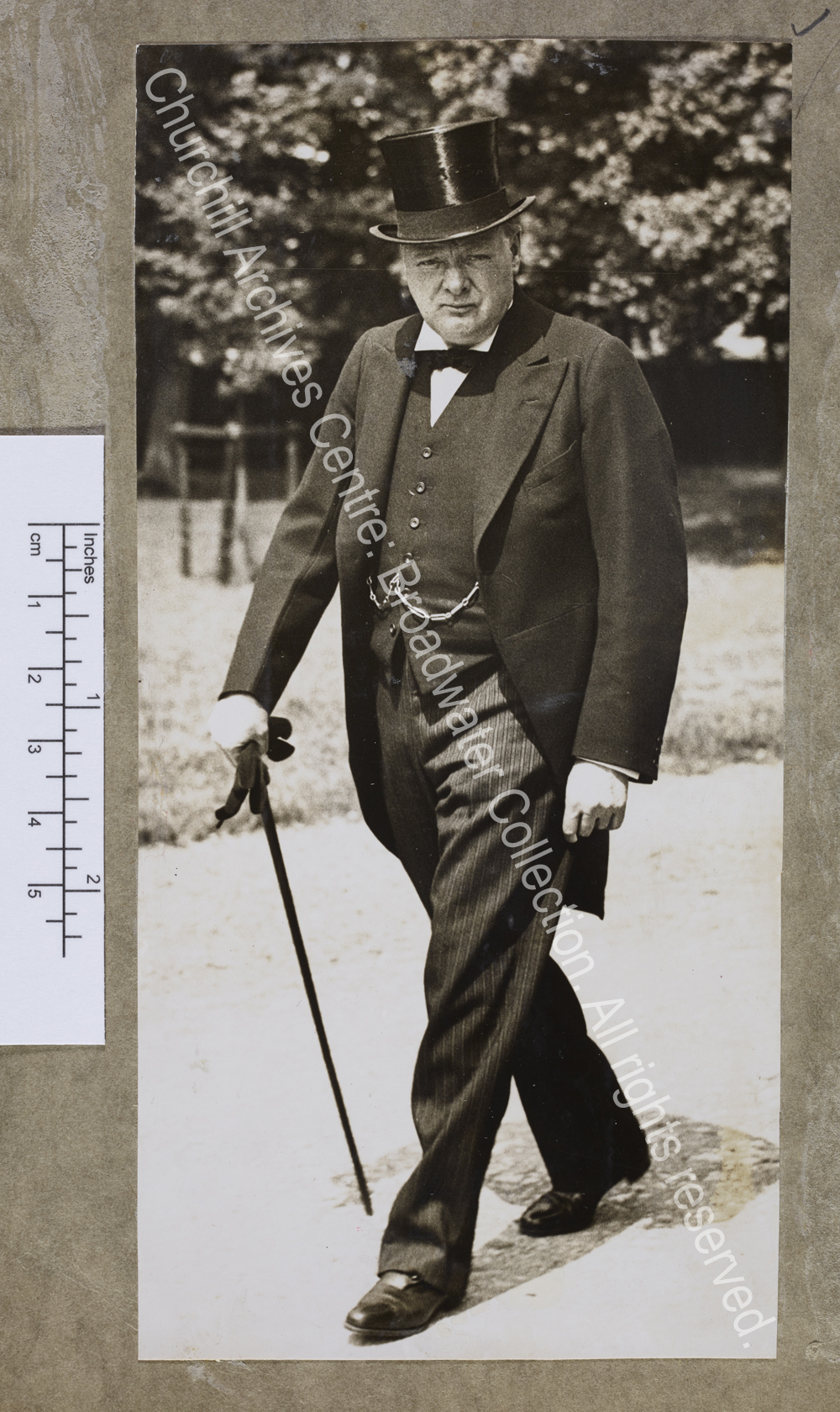 Full length photograph of WSC walking along a path at Blenheim [Oxfordshire]