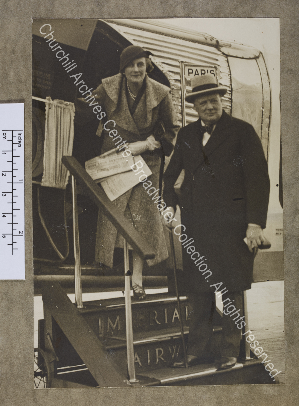 Photograph of WSC and CSC boarding an Imperial Airways plane at Croydon [Surrey] for Paris [France
