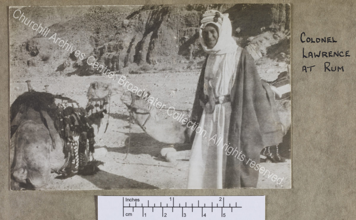 Three quarter length photograph of T E Lawrence ["Lawrence of Arabia"